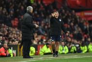 MANCHESTER, ENGLAND - JANUARY 29: Warren Joyce manager of Wigan Athletic gives instructions as Jose Mourinho manager of Manchester United looks on during the Emirates FA Cup Fourth round match between Manchester United and Wigan Athletic at Old Trafford on January 29, 2017 in Manchester, England. (Photo by Gareth Copley/Getty Images)