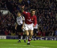 5 Dec 2001: Laurent Blanc of Man Utd celebrates after scoring the second goal during the Manchester United v Boavista UEFA Champions League, Group A match at Old Trafford, Manchester. DIGITAL IMAGE Mandatory Credit: Ross Kinnaird/ALLSPORT