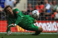LONDON - AUGUST 05: Edwin Van der Sar of Manchester United saves from Frank Lampard of Chelsea look in the shoot out during the FA Community Shield match between Chelsea and Manchester United at Wembley Stadium on August 5, 2007 in London,England. (Photo by Jamie McDonald/Getty Images)