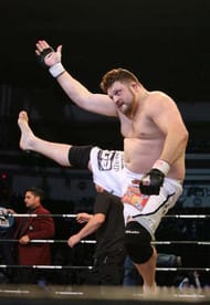LAS VEGAS - FEBRUARY 29: Roy Nelson white trunks of Lion's Den celebrates his victory over Fabiano Scherner red trunks of Team Quest during their Heavyweight title bout at The Orleans Arena on February 29, 2008 in Las Vegas, Nevada. (Photo by Ethan Miller/Getty Images)
