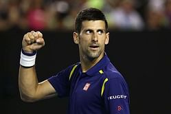 Shane Warne bowls to Novak Djokovic on the tennis court ahead of the Australian Open