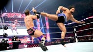 Rusev delivering a kick to Zack Ryder on RAW