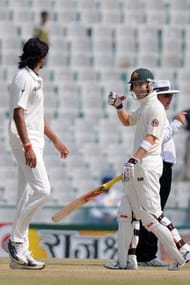 MOHALI, INDIA - OCTOBER 04: Michael Clarke (R) of Australia smiles at Ishant Sharma after he was declared not out on a no-ball during the first Test match between India and Australia at Punjab Cricket Association Stadium on October 5, 2010 in Mohali, India. (Photo by Pal Pillai/Getty Images)