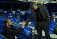MADRID, SPAIN - APRIL 16: Barcelona manager (L) Josep Guardiola shakes hands with head coach Jose Mourinho of Real Madrid before the start of the La Liga match between Real Madrid and Barcelona at Estadio Santiago Bernabeu on April 16, 2011 in Madrid, Spain. (Photo by Denis Doyle/Getty Images)