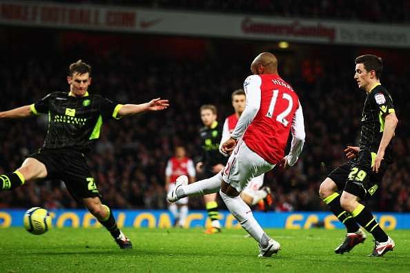LONDON, ENGLAND - JANUARY 09:  Thierry Henry (C) of Arsenal scores during the FA Cup Third Round match between Arsenal and Leeds United at the Emirates Stadium on January 9, 2012 in London, England.  (Photo by Clive Mason/Getty Images)