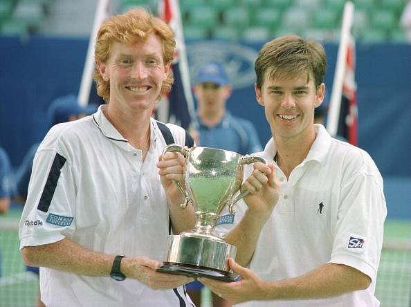 25 Jan 1997:  Mark Woodforde and Todd Woodbridge of Australia hold the trophy aloft after victory in the mens doubles final match at the Ford Australian Open in Melbourne, Australia. Mandatory Credit: Clive Brunskill/ALLSPORT