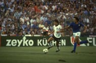 11 Jul 1982: Paul Breitner (left) of West Germany goes past Antonio Scirea (right) of Italy during the World Cup final at the Bernabeu stadium in Madrid, Spain. Italy won the match 3-1. \ Mandatory Credit: Steve Powell/Allsport