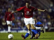 GLASGOW, SCOTLAND - OCTOBER 22: Fernando Ricksen of Rangers clashes with Roy Keane of Man Utd during the UEFA Champions League, Group E match between Glasgow Rangers and Manchester United at Ibrox on October 22, 2003 in Glasgow, Scotland. (Photo by Alex Livesey/Getty Images)