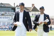 NOTTINGHAM, ENGLAND - JULY 09: England captain Alastair Cook walks out for the toss alongside Mahendra Singh Dhoni of India ahead of day one of 1st Investec Test match between England and India at Trent Bridge on July 9, 2014 in Nottingham, England. (Photo by Gareth Copley/Getty Images)
