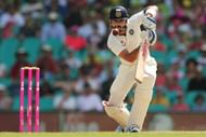 SYDNEY, AUSTRALIA - JANUARY 09: Virat Kohli of India plays a cover drive during day four of the Fourth Test match between Australia and India at Sydney Cricket Ground on January 9, 2015 in Sydney, Australia. (Photo by Brendon Thorne/Getty Images)
