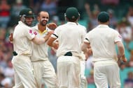 SYDNEY, AUSTRALIA - JANUARY 10: Nathan Lyon of Australia celebrates with team mates after dismissing Wriddhiman Saha of India during day five of the Fourth Test match between Australia and India at Sydney Cricket Ground on January 10, 2015 in Sydney, Australia. (Photo by Cameron Spencer/Getty Images)