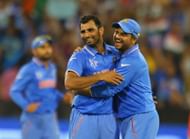 MELBOURNE, AUSTRALIA - FEBRUARY 22: Mohammed Shami of India celebrates with Suresh Raina after dismissing Dale Steyn of South Africa during the 2015 ICC Cricket World Cup match between South Africa and India at Melbourne Cricket Ground on February 22, 2015 in Melbourne, Australia. (Photo by Scott Barbour/Getty Images)