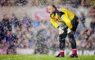 NEWCASTLE, UNITED KINGDOM - NOVEMBER 21: Liverpool goalkeeper Bruce Grobbelaar looks on during a snow shower during a 3-0 win to Newcastle during the FA Premier league match between Newcastle United and Liverpool at St James' Park on November 21, 1993 in Newcastle, England, (Photo by Shaun Botterill/Allsport/Getty Images)