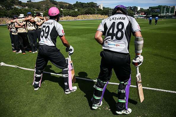 WELLINGTON, NEW ZEALAND - FEBRUARY 28:  Dean Brownlie and Tom Latham of South Island prepare to take the field during the Island of Origin Twenty20 at Basin Reserve on February 28, 2016 in Wellington, New Zealand.  (Photo by Hagen Hopkins/Getty Images)