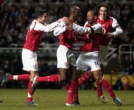 NEWCASTLE, ENGLAND - DECEMBER 29: Thierry Henry of Arsenal congratulates Patrick Vieira on his goal during the FA Barclays Premiership match between Newcastle United and Arsenal at St.James Park on December 29, 2004 in Newcastle, England. (Photo by Matthew Lewis/Getty Images)