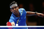 DUBAI, UNITED ARAB EMIRATES - APRIL 28: Sharath Kamal Achanta of India in action against Wong Chun Ting of Hong Kong during day one of the Nakheel Table Tennis Asian Cup 2016 at Dubai World Trade Centre on April 28, 2016 in Dubai, United Arab Emirates. (Photo by Warren Little/Getty Images)