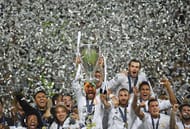 MILAN, ITALY - MAY 28: Sergio Ramos of Real Madrid lifts the Champions League trophy after victory in the UEFA Champions League Final match between Real Madrid and Club Atletico de Madrid at Stadio Giuseppe Meazza on May 28, 2016 in Milan, Italy. (Photo by Laurence Griffiths/Getty Images)