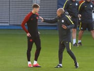 MANCHESTER, ENGLAND - OCTOBER 18: Pep Guardiola the manager of Manchester City talks with John Stones during a training session at City Academy on October 18, 2016 in Manchester, England. (Photo by Alex Livesey/Getty Images)
