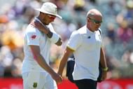 PERTH, AUSTRALIA - NOVEMBER 04: Dale Steyn of South Africa walks from the field with the team physio after injuring his shoulder during day two of the First Test match between Australia and South Africa at the WACA on November 4, 2016 in Perth, Australia. (Photo by Paul Kane/Getty Images)