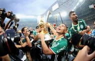 SAO PAULO, BRAZIL - NOVEMBER 27: Gabriel Jesus of Palmeiras celebrates with the trophy after winning the match between Palmeiras and Chapecoense for the Brazilian Series A 2016 at Allianz Parque on November 27, 2016 in Sao Paulo, Brazil. (Photo by Friedemann Vogel/Getty Images)