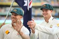 BRISBANE, AUSTRALIA - DECEMBER 17: David Warner and Steve Smith of Australia smile during day three of the First Test match between Australia and Pakistan at The Gabba on December 17, 2016 in Brisbane, Australia. (Photo by Chris Hyde/Getty Images)