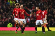 MANCHESTER, ENGLAND - JANUARY 15: Zlatan Ibrahimovic of Manchester United (2L) celebrates with team mates as he scores their first and equalising goal during the Premier League match between Manchester United and Liverpool at Old Trafford on January 15, 2017 in Manchester, England. (Photo by Laurence Griffiths/Getty Images)