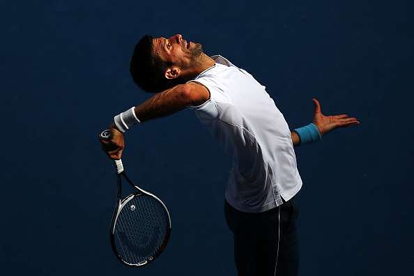 MELBOURNE, AUSTRALIA - JANUARY 19:  Novak Djokovic of Serbia serves in his second round match against Denis Istomin of Uzbekistan on day four of the 2017 Australian Open at Melbourne Park on January 19, 2017 in Melbourne, Australia.  (Photo by Clive Brunskill/Getty Images)