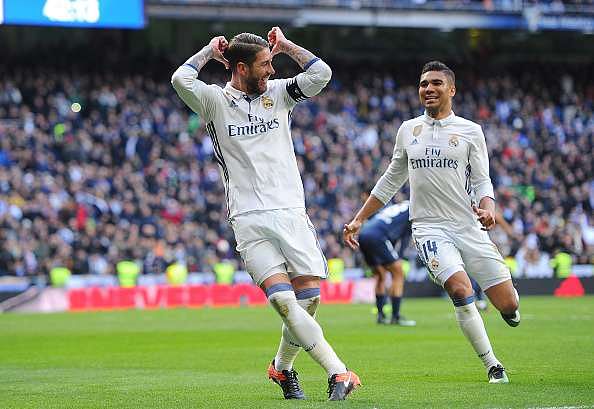 MADRID, SPAIN - JANUARY 21:  Sergio Ramos of Real Madrid celebrates with Henrique Casemiro after scoring his team&#039;s 2nd goal during the La Liga match between Real Madrid CF and Malaga CF at the Bernabeu on January 21, 2017 in Madrid, Spain.  (Photo by Denis Doyle/Getty Images)