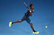 MELBOURNE, AUSTRALIA - JANUARY 23: Gael Monfils of France plays a backhand in his fourth round match against Rafael Nadal of Spain on day eight of the 2017 Australian Open at Melbourne Park on January 23, 2017 in Melbourne, Australia. (Photo by Scott Barbour/Getty Images)