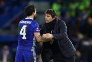 LONDON, ENGLAND - JANUARY 28: Antonio Conte, Manager of Chelsea speaks with Cesc Fabregas of Chelsea during the Emirates FA Cup Fourth Round match between Chelsea and Brentford at Stamford Bridge on January 28, 2017 in London, England. (Photo by Clive Mason/Getty Images)