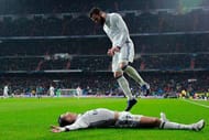 MADRID, SPAIN - JANUARY 29: Cristiano Ronaldo (bottom) of Real Madrid CF celebrates scoring their second goal with teammate Nacho Fernandez (R) during the La Liga match between Real Madrid CF and Real Sociedad de Futbol at Estadio Santiago Bernabeu on January 29, 2017 in Madrid, Spain. (Photo by Gonzalo Arroyo Moreno/Getty Images)
