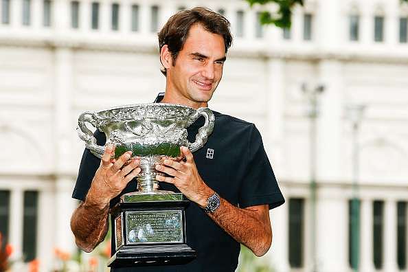 MELBOURNE, AUSTRALIA - JANUARY 30:  Roger Federer of Switzerland poses with the Norman Brookes Challenge Cup after winning the 2017 Australian Open Men&#039;s Singles Final, on January 30, 2017 in Melbourne, Australia.  (Photo by Daniel Pockett/Getty Images)