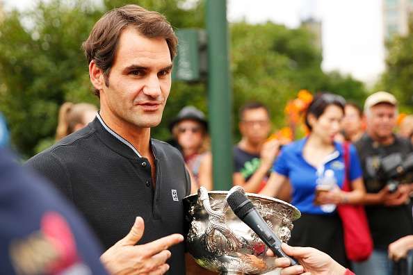 MELBOURNE, AUSTRALIA - JANUARY 30: Roger Federer of Switzerland talks to the media whilst holding the Norman Brookes Challenge Cup after winning the 2017 Australian Open Men's Singles Final, on January 30, 2017 in Melbourne, Australia. (Photo by Daniel Pockett/Getty Images)