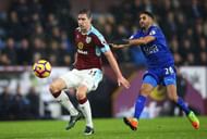 BURNLEY, ENGLAND - JANUARY 31: Stephen Ward of Burnley and Riyad Mahrez of Leicester City compete for the ball during the Premier League match between Burnley and Leicester City at Turf Moor on January 31, 2017 in Burnley, England. (Photo by Alex Livesey/Getty Images)