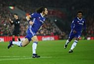 LIVERPOOL, ENGLAND - JANUARY 31: David Luiz of Chelsea celebrates scoring the opening goal during the Premier League match between Liverpool and Chelsea at Anfield on January 31, 2017 in Liverpool, England. (Photo by Clive Mason/Getty Images)