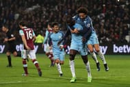 STRATFORD, ENGLAND - FEBRUARY 01: Yaya Toure of Manchester City celebrates scoring his team's fourth goal with Leroy Sane during the Premier League match between West Ham United and Manchester City at London Stadium on February 1, 2017 in Stratford, England. (Photo by Clive Rose/Getty Images)