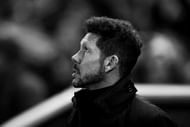 MADRID, SPAIN - FEBRUARY 01: (EDITOR'S NOTE: Image has been converted to black and white) Coach Diego Pablo Simeone of Atletico de Madrid looks up prior to start the Copa del Rey semi-final first leg match between Club Atletico de Madrid and FC Barcelona at Estadio Vicente Calderon on February 1, 2017 in Madrid, Spain. (Photo by Gonzalo Arroyo Moreno/Getty Images)