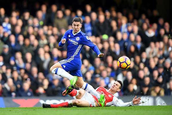 LONDON, ENGLAND - FEBRUARY 04:  Eden Hazard of Chelsea battles for the ball with Laurent Koscielny of Arsenal during the Premier League match between Chelsea and Arsenal at Stamford Bridge on February 4, 2017 in London, England.  (Photo by Mike Hewitt/Getty Images)