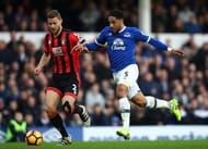 LIVERPOOL, ENGLAND - FEBRUARY 04: Simon Francis of AFC Bournemouth (L) is put under pressure from Ashley Williams of Everton (R) during the Premier League match between Everton and AFC Bournemouth at Goodison Park on February 4, 2017 in Liverpool, England. (Photo by Clive Brunskill/Getty Images)