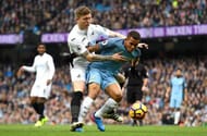 MANCHESTER, ENGLAND - FEBRUARY 05: Gabriel Jesus of Manchester City holds off Alfie Mawson of Swansea City during the Premier League match between Manchester City and Swansea City at Etihad Stadium on February 5, 2017 in Manchester, England. (Photo by Stu Forster/Getty Images)