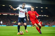 LIVERPOOL, ENGLAND - FEBRUARY 11: Harry Kane of Tottenham Hotspur and Lucas Leiva of Liverpool compete for the ball during the Premier League match between Liverpool and Tottenham Hotspur at Anfield on February 11, 2017 in Liverpool, England. (Photo by Clive Brunskill/Getty Images)