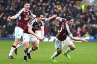 BURNLEY, ENGLAND - FEBRUARY 12: Robbie Brady of Burnley (R) celebrates scoring his sides first goal with Joey Barton during the Premier League match between Burnley and Chelsea at Turf Moor on February 12, 2017 in Burnley, England. (Photo by Mike Hewitt/Getty Images)