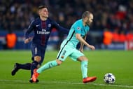PARIS, FRANCE - FEBRUARY 14: Andres Iniesta of Barcelona battles for the ball with Marco Verratti of Paris Saint-Germain during the UEFA Champions League Round of 16 first leg match between Paris Saint-Germain and FC Barcelona at Parc des Princes on February 14, 2017 in Paris, France. (Photo by Clive Rose/Getty Images)
