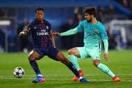 PARIS, FRANCE - FEBRUARY 14: Andre Gomes of Barcelona battles for the ball with Presnel Kimpembe of Paris Saint-Germain during the UEFA Champions League Round of 16 first leg match between Paris Saint-Germain and FC Barcelona at Parc des Princes on February 14, 2017 in Paris, France. (Photo by Clive Rose/Getty Images)