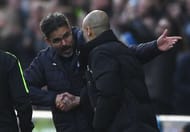 HUDDERSFIELD, ENGLAND - FEBRUARY 18: David Wagner, Manager of Huddersfield Town (L) and Josep Guardiola, Manager of Manchester City (R) embrace after The Emirates FA Cup Fifth Round match between Huddersfield Town and Manchester City at John Smith's Stadium on February 18, 2017 in Huddersfield, England. (Photo by Gareth Copley/Getty Images)
