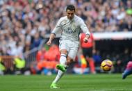 MADRID, SPAIN - FEBRUARY 18: Cristiano Ronaldo of Real Madrid takes a free kick during the La Liga match between Real Madrid CF and RCD Espanyol at the Bernabeu stadium on February 18, 2017 in Madrid, Spain. (Photo by Denis Doyle/Getty Images)