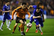 WOLVERHAMPTON, ENGLAND - FEBRUARY 18: Wander Helder Costa of Wolves (L) attempts to take it past Pedro of Chelsea (R) during The Emirates FA Cup Fifth Round match between Wolverhampton Wanderers and Chelsea at Molineux on February 18, 2017 in Wolverhampton, England. (Photo by Shaun Botterill/Getty Images)