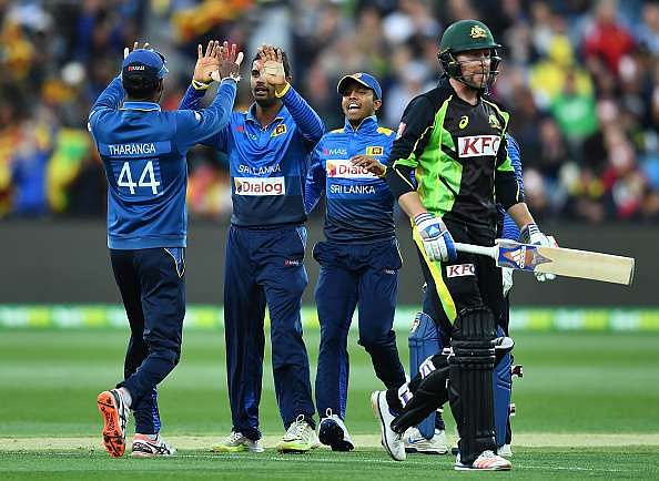 GEELONG, AUSTRALIA - FEBRUARY 19:  Asela Gunaratne of Sri Lanka is congratulated by team mates after getting the wicket of Ben Dunk of Australia during the second International Twenty20 match between Australia and Sri Lanka at Simonds Stadium on February 19, 2017 in Geelong, Australia.  (Photo by Quinn Rooney/Getty Images)