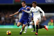 LONDON, ENGLAND - FEBRUARY 25: Cesar Azpilicueta of Chelsea (L) and Tom Carroll of Swansea City (R) battle for possession during the Premier League match between Chelsea and Swansea City at Stamford Bridge on February 25, 2017 in London, England. (Photo by Bryn Lennon/Getty Images)