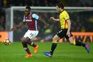 WATFORD, ENGLAND - FEBRUARY 25: Michail Antonio of West Ham United evades Daryl Janmaat of Watford during the Premier League match between Watford and West Ham United at Vicarage Road on February 25, 2017 in Watford, England. (Photo by Jordan Mansfield/Getty Images)